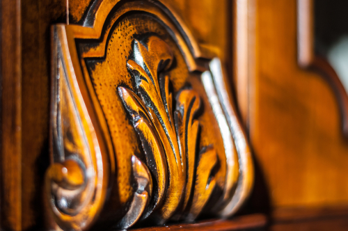 Detail,of,an,oiled,inlaid,antique,wood,furniture
